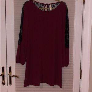 Burgundy dress with black lace back and sleeves
